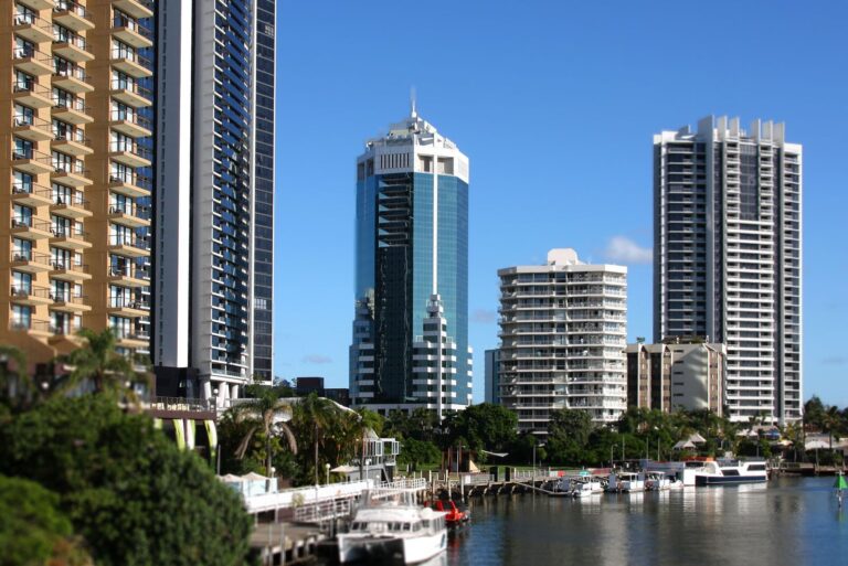 Skyscrapers and boats along the Gold Coast waterfront.