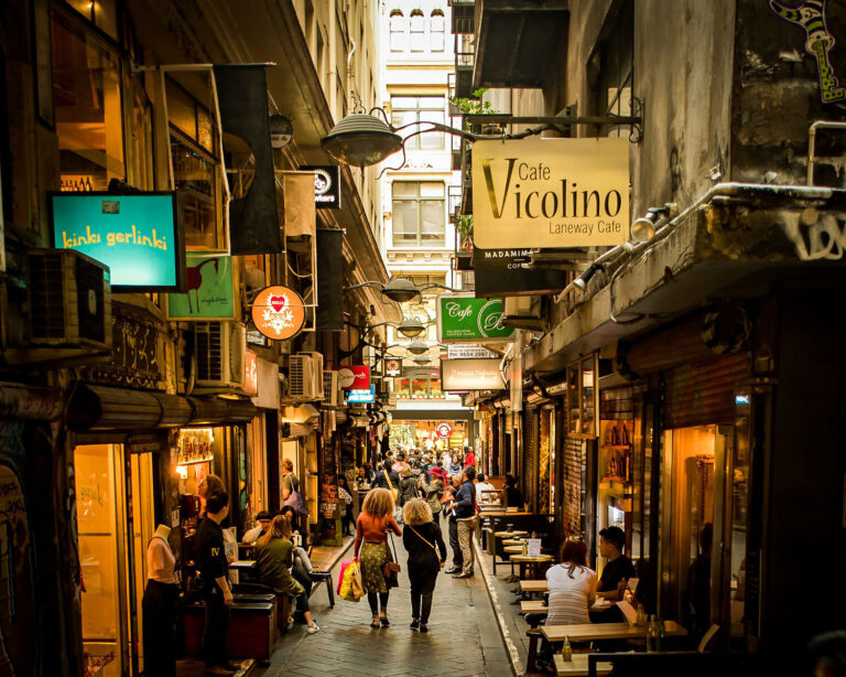 Melbourne laneway with cafes and people.