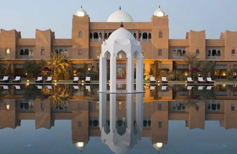 Luxurious Morocco Sahara Palace Hotel with reflecting pool
