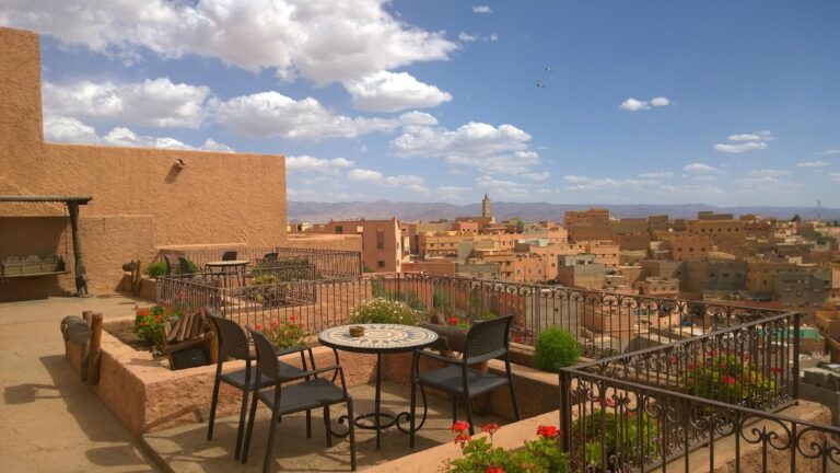 Rooftop terrace in Morocco with city and desert views