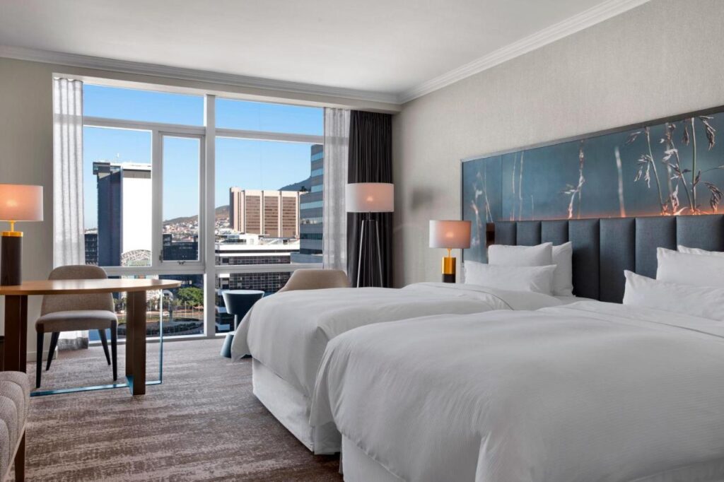 Modern hotel room with city view in South Africa.