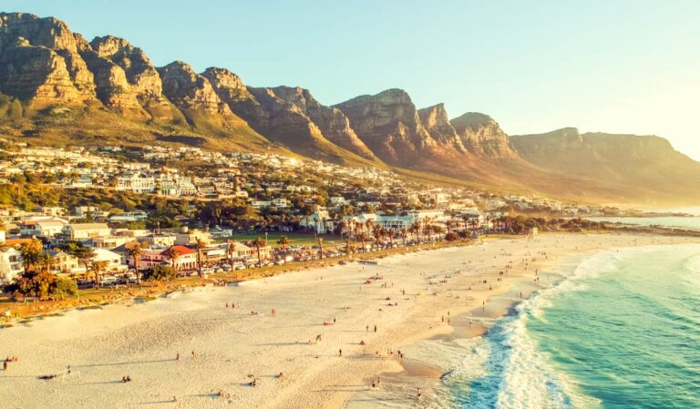 Beach and mountains at sunset in Cape Town.
