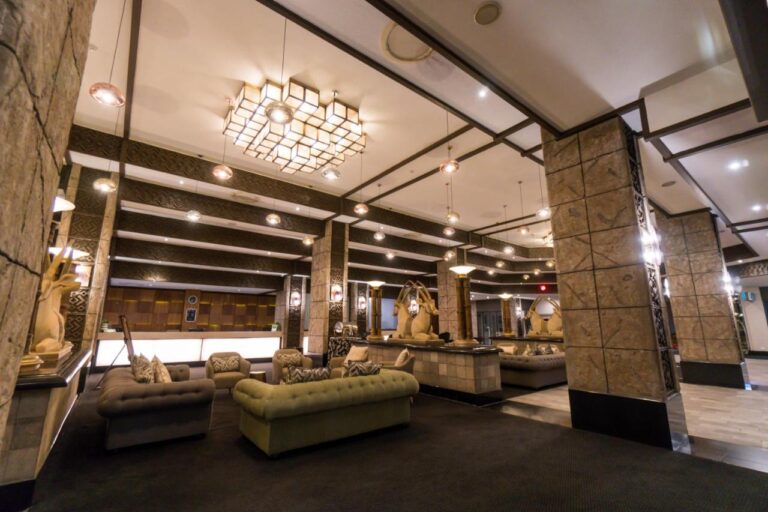 Luxurious hotel lobby with elegant seating and modern design.
