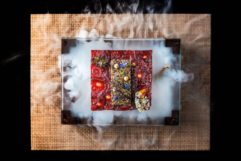 Gourmet dish with molecular gastronomy presentation