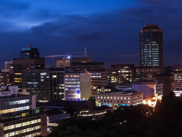 Harare skyline at night with illuminated buildings