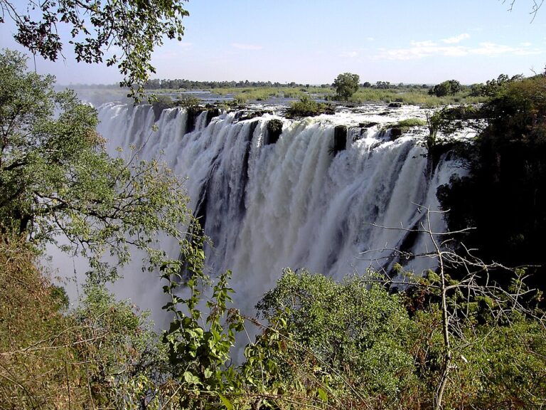 Victoria Falls waterfall with surrounding greenery