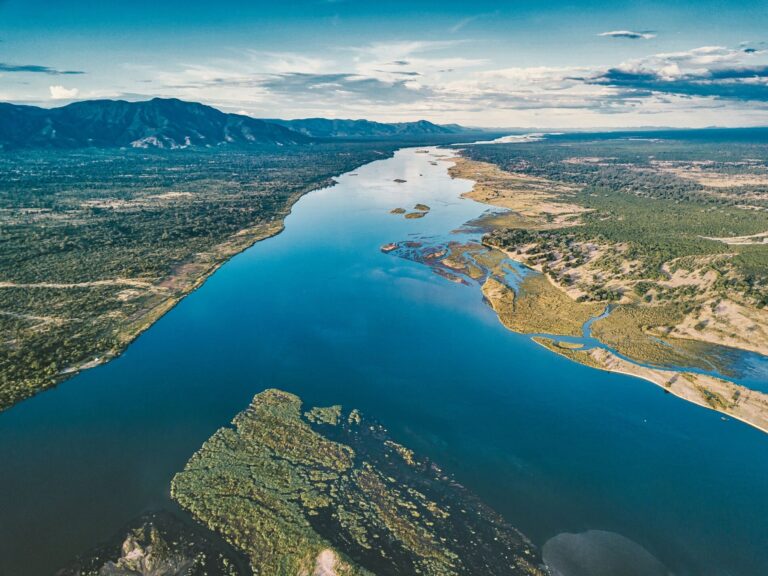 Aerial view of the Zambezi River with surrounding landscape.