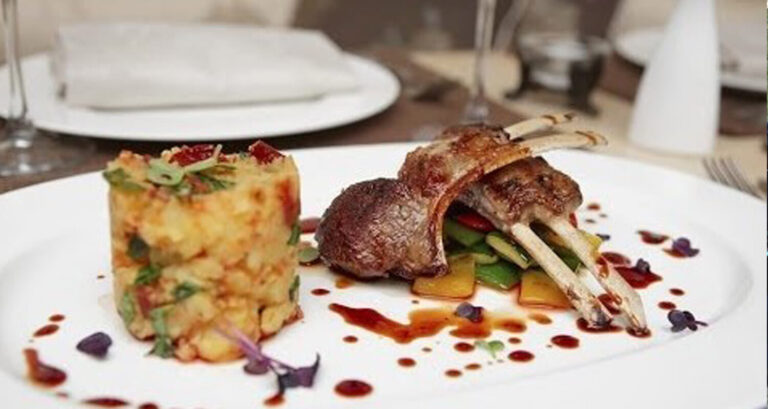 Gourmet lamb chops with vegetable medley at Lake Bogoria Hotel.
