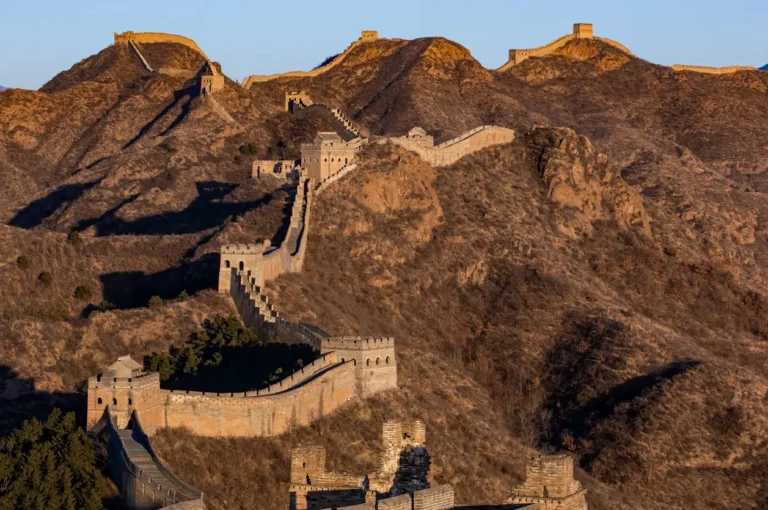 The Great Wall of China stretching over mountainous terrain.