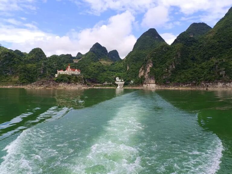 Scenic view of Wanfeng Lake with karst mountains in the background
