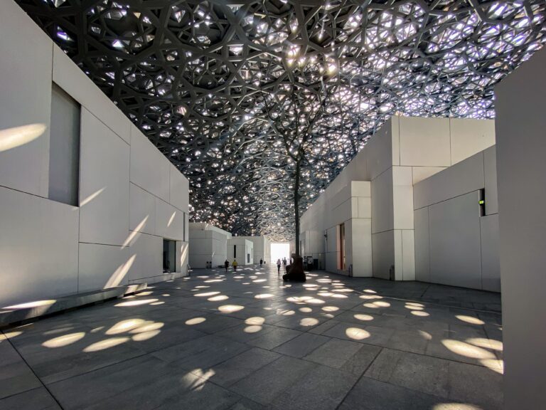 Interior of Louvre Abu Dhabi with intricate ceiling design