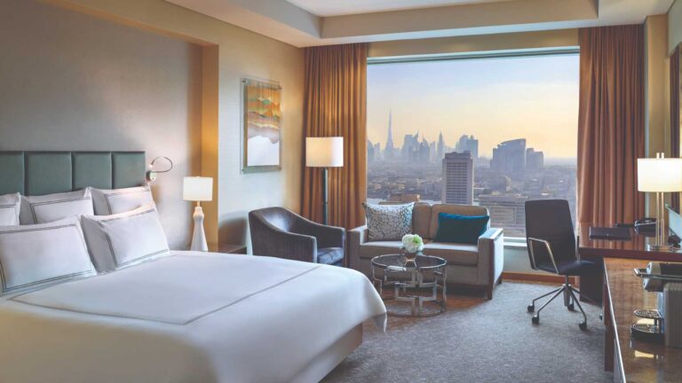 Luxury hotel room in Dubai with city skyline view