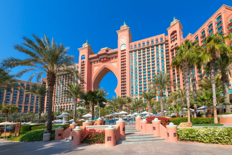 Atlantis The Palm hotel in Dubai with palm trees.