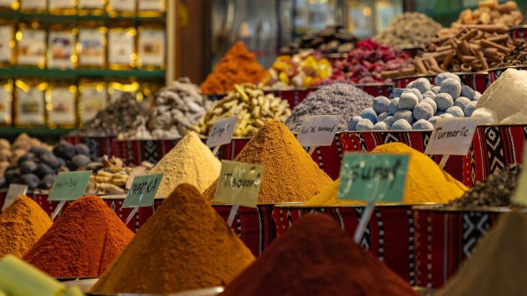 Vibrant spices in Dubai's traditional market.