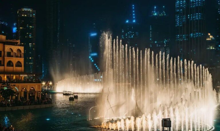 Dubai Fountain night show with city lights