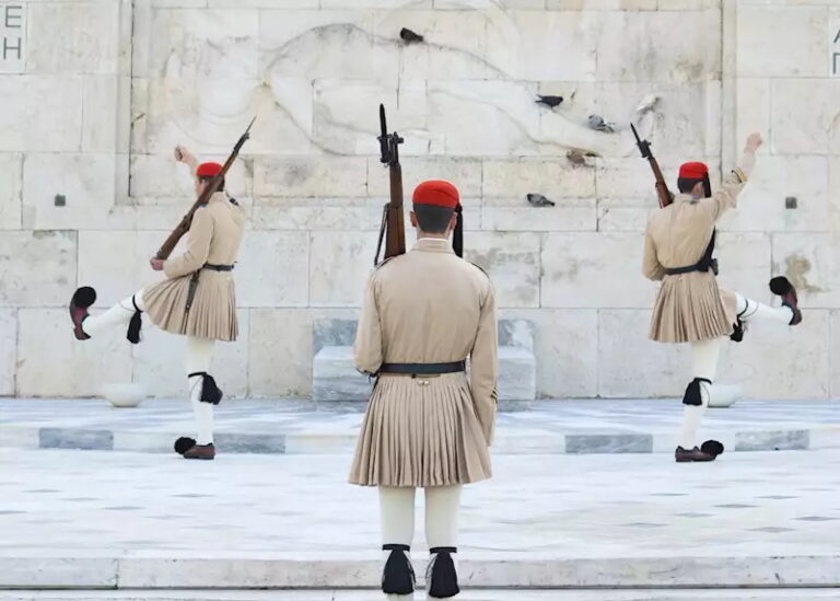 Traditional Evzones guards performing ceremony in Athens