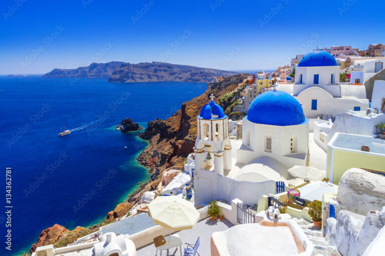 Blue domes and white buildings in Oia, Santorini.