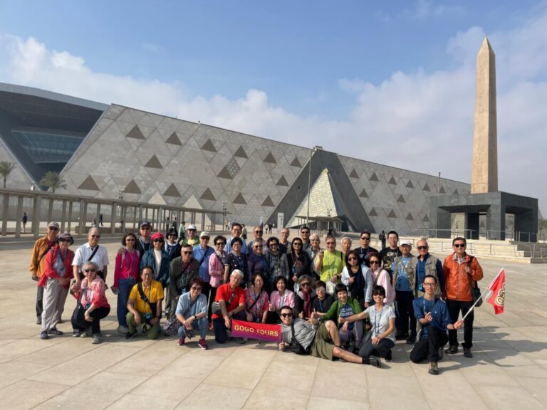 GoGo Tours travelers in front of the Grand Egyptian Museum.