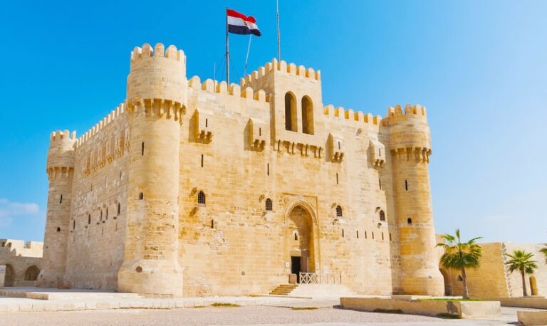 Citadel of Qaitbay in Alexandria with Egyptian flag