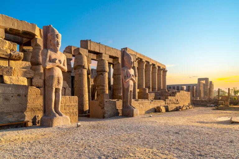 Ancient statues and columns at Karnak Temple in Egypt