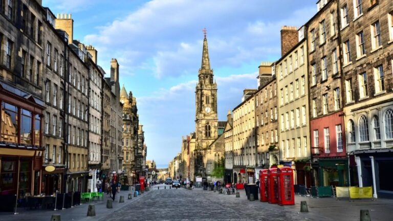 The historic Royal Mile in Edinburgh with the Adam Smith Statue.