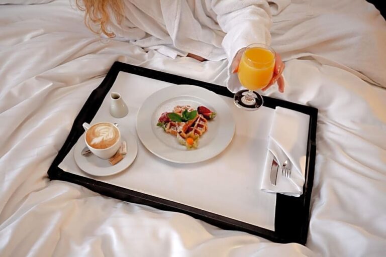 Breakfast in bed at Crowne Plaza Bratislava with orange juice and waffles.