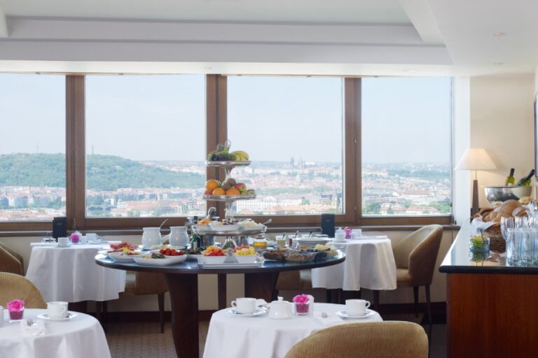 Hotel breakfast buffet with city view in Prague