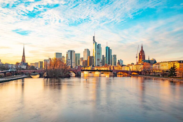 Frankfurt skyline with Main River at sunset