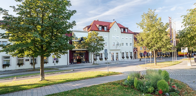 Hotel Rappen street view with surrounding trees and buildings