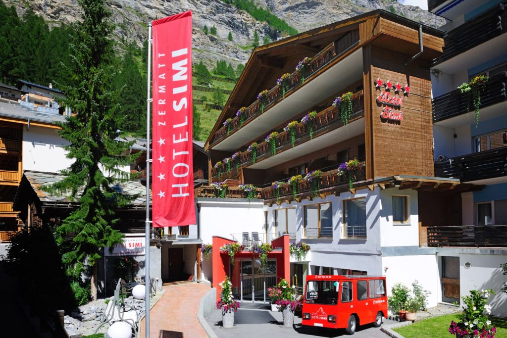 Hotel Simi in Zermatt with mountain backdrop