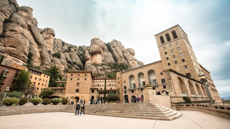 Montserrat Monastery nestled in rocky mountains.