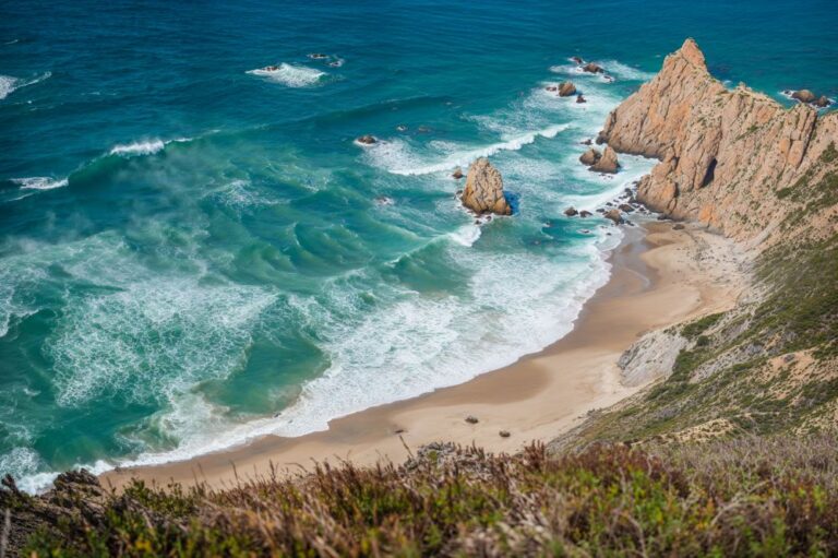 Rugged cliffs and beach at Cabo da Roca, Portugal.