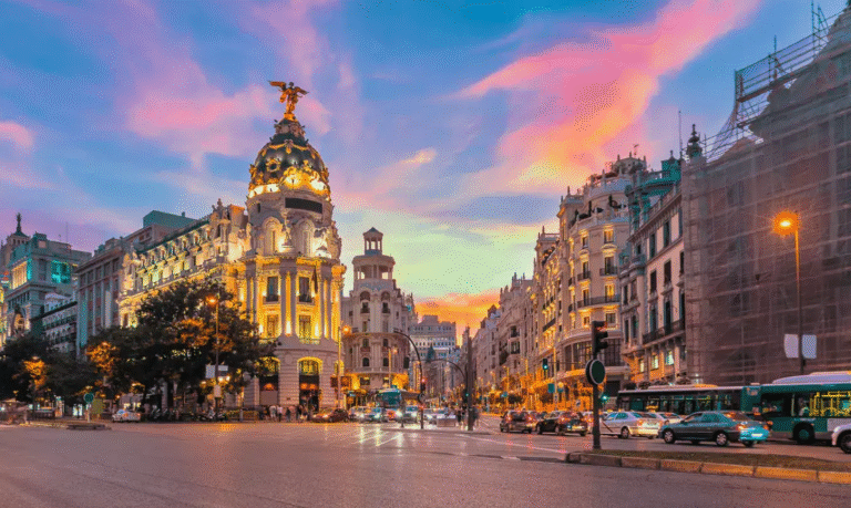 Metropolis Building in Madrid at sunset