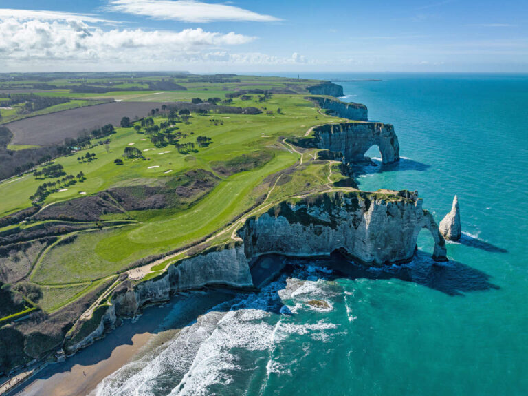 Aerial view of Étretat Cliffs and golf course in Normandy.
