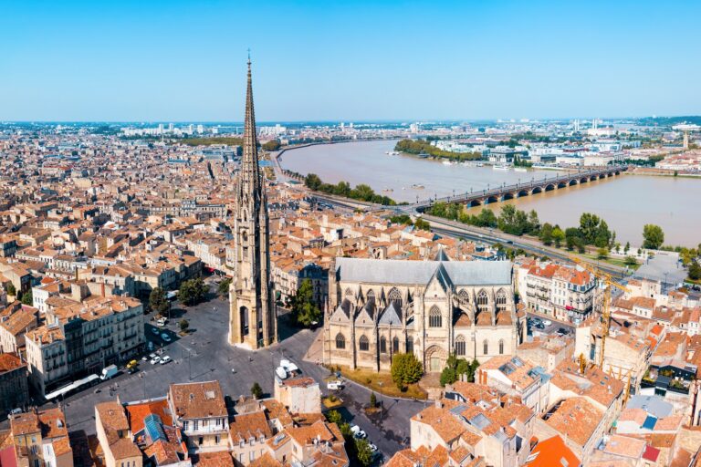 Aerial view of Basilica of St. Michael in Bordeaux with Garonne River.