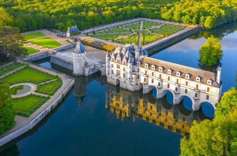 Château de Chenonceau with gardens and river reflection