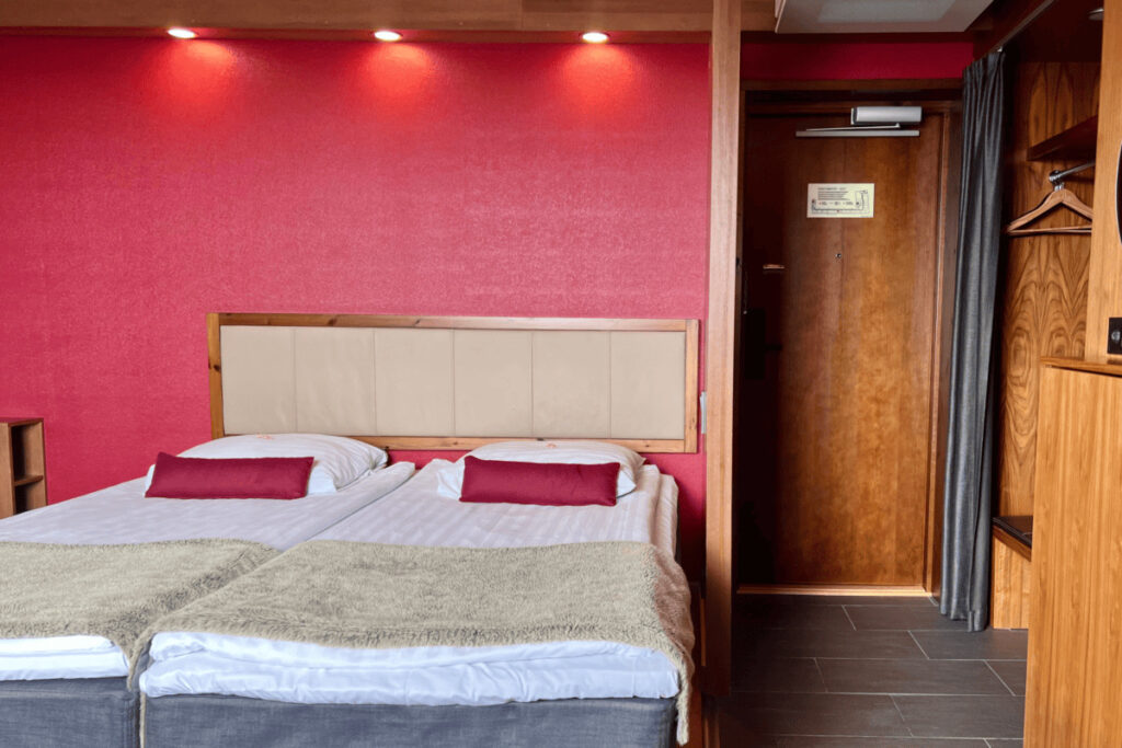 Cozy hotel room in Santa Claus Village with twin beds