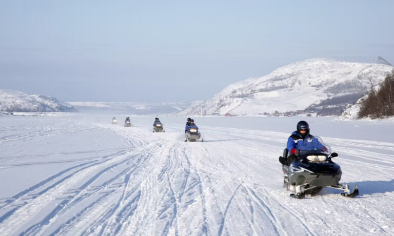 Snowmobilers on an Arctic adventure