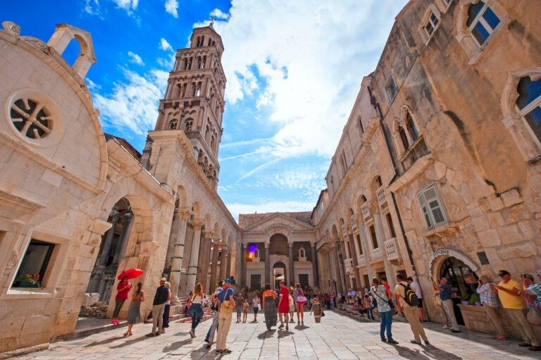 Tourists exploring Diocletian's Palace in Split, Croatia.