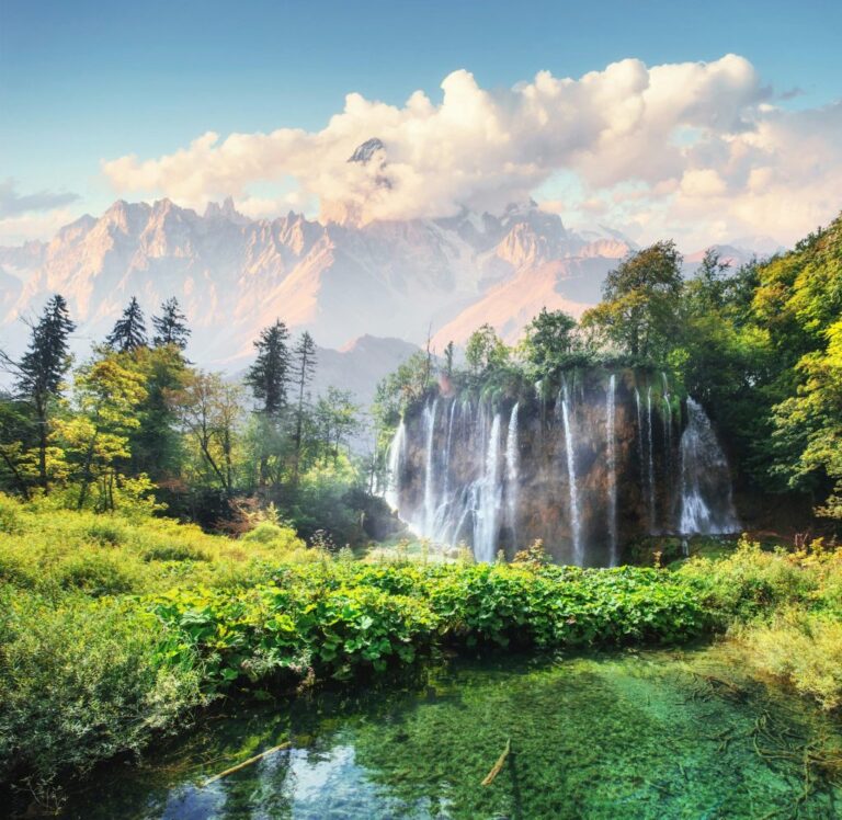 Scenic view of waterfalls and mountains in Plitvice National Park