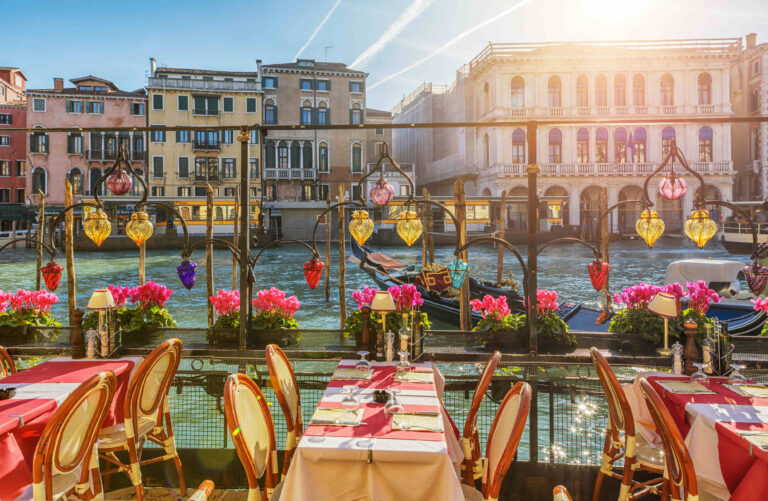 Scenic restaurant view on the Grand Canal in Venice.