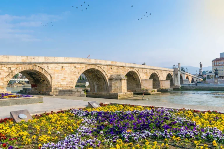 Stone Bridge in Skopje with colorful flowers