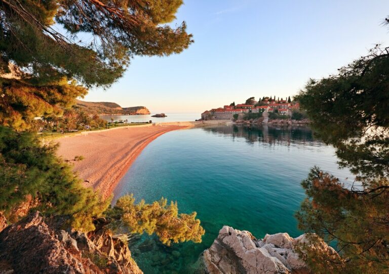 Scenic view of Sveti Stefan beach and resort in Montenegro.