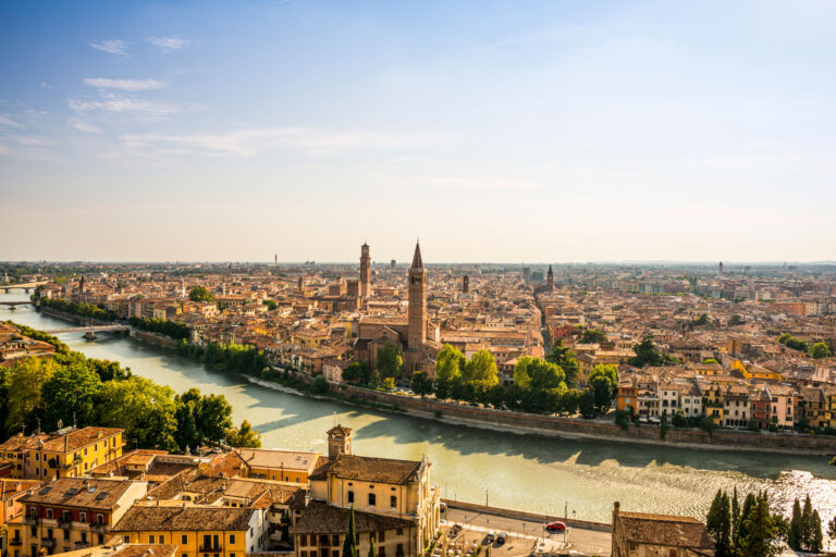Verona cityscape with Adige River and historic buildings.
