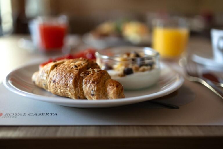 Croissant and yogurt breakfast at Royal Caserta Hotel.