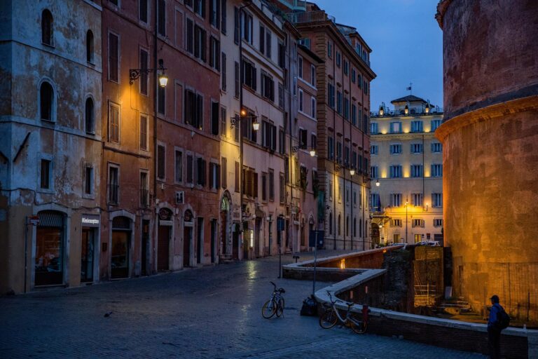 Historic European street at dusk with Italian architecture
