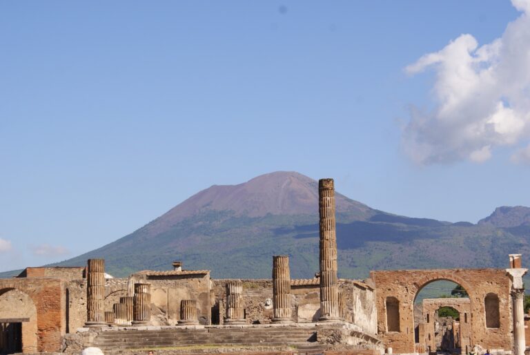 Ancient ruins of Pompeii with Mount Vesuvius in the background