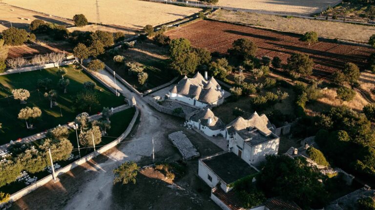 Aerial view of trulli houses in the Italian countryside