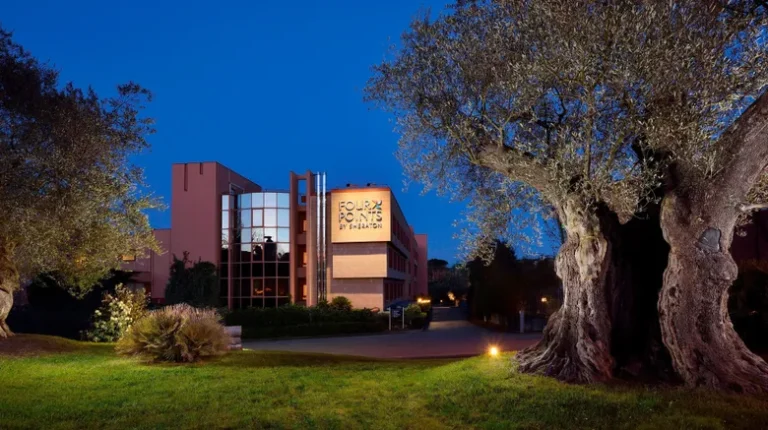 Four Points by Sheraton hotel exterior in Siena at night