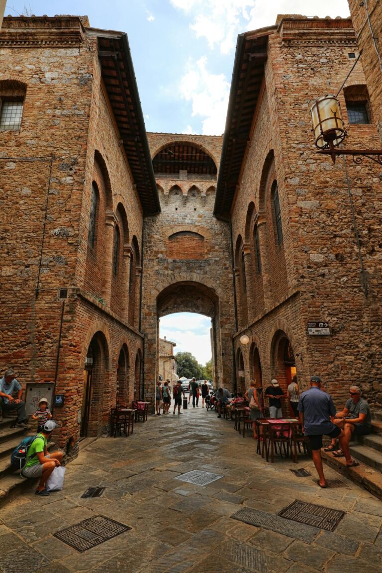 Historic archway street scene in San Gimignano